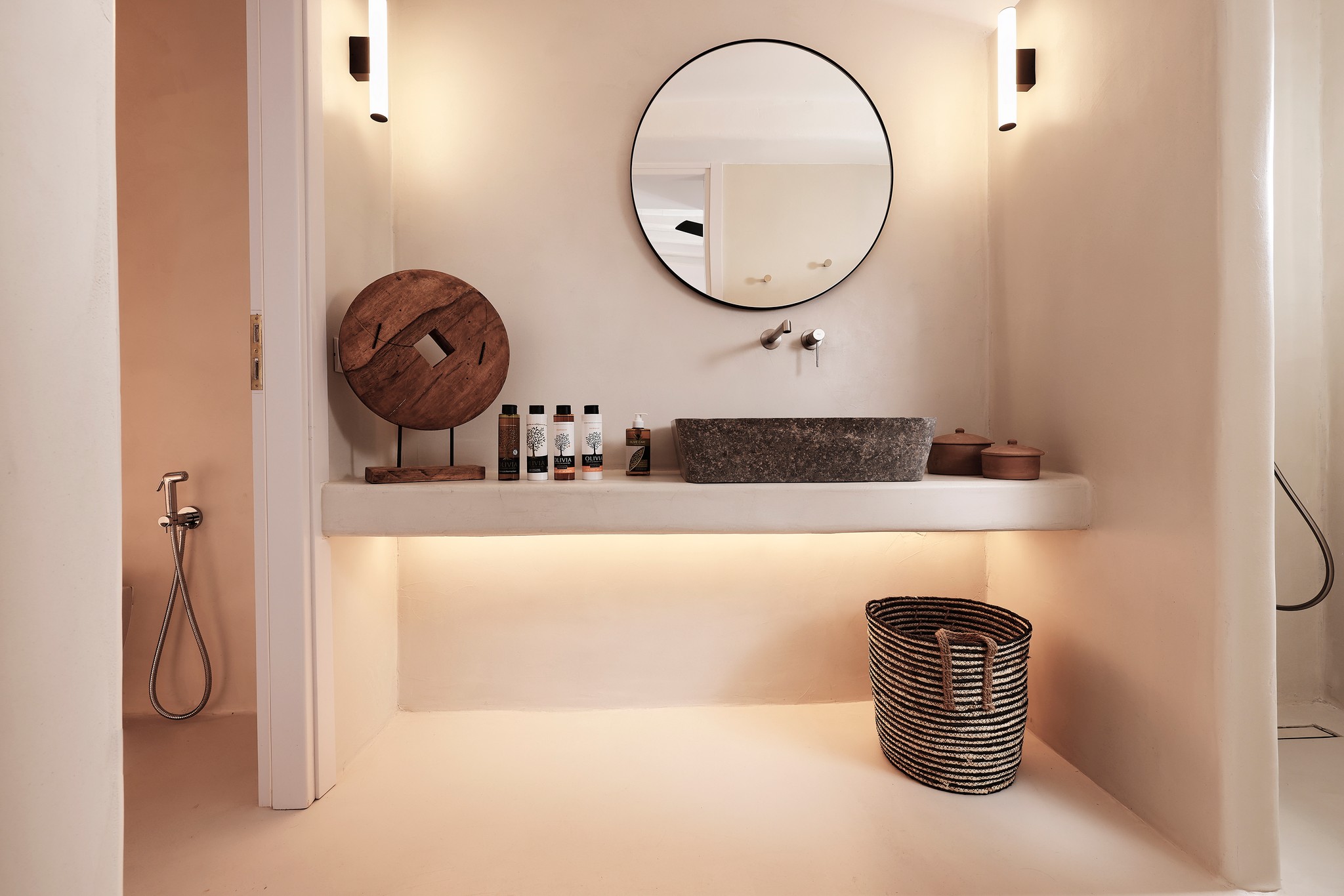 Master bedroom on the upper level of the main house (view 5) at Bali Sea Front Villa in Ftelia, Mykonos