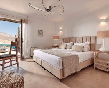 En suite bedroom on the lower level of the main house at Bali Sea Front Villa in Ftelia, Mykonos