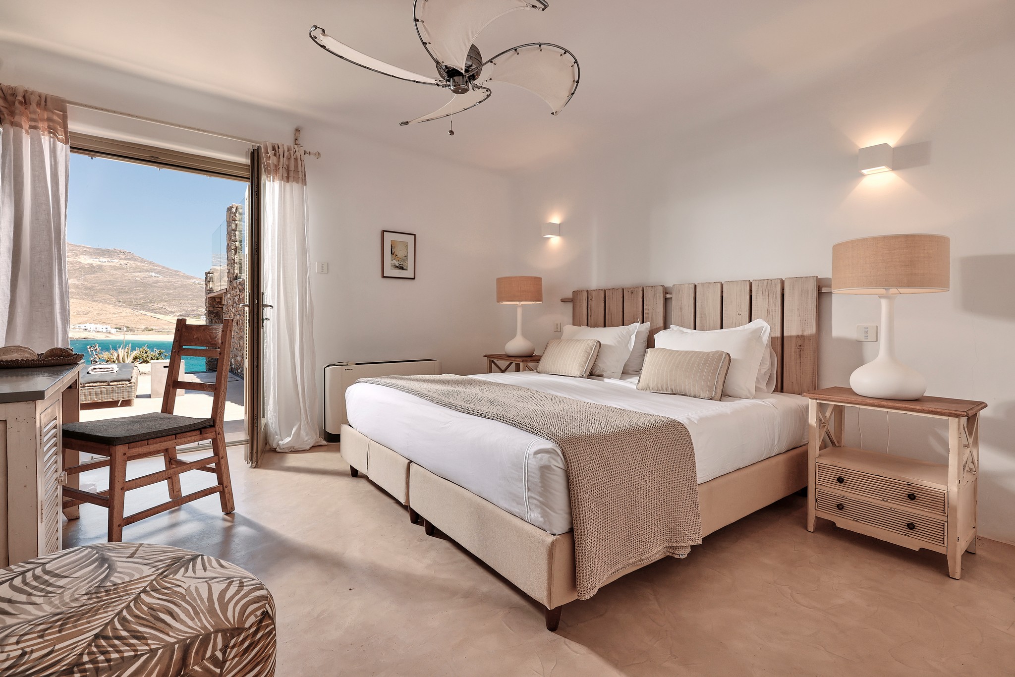 En suite bedroom on the lower level of the main house at Bali Sea Front Villa in Ftelia, Mykonos