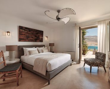 En suite bedroom on the lower level of the main house at Bali Sea Front Villa in Ftelia, Mykonos