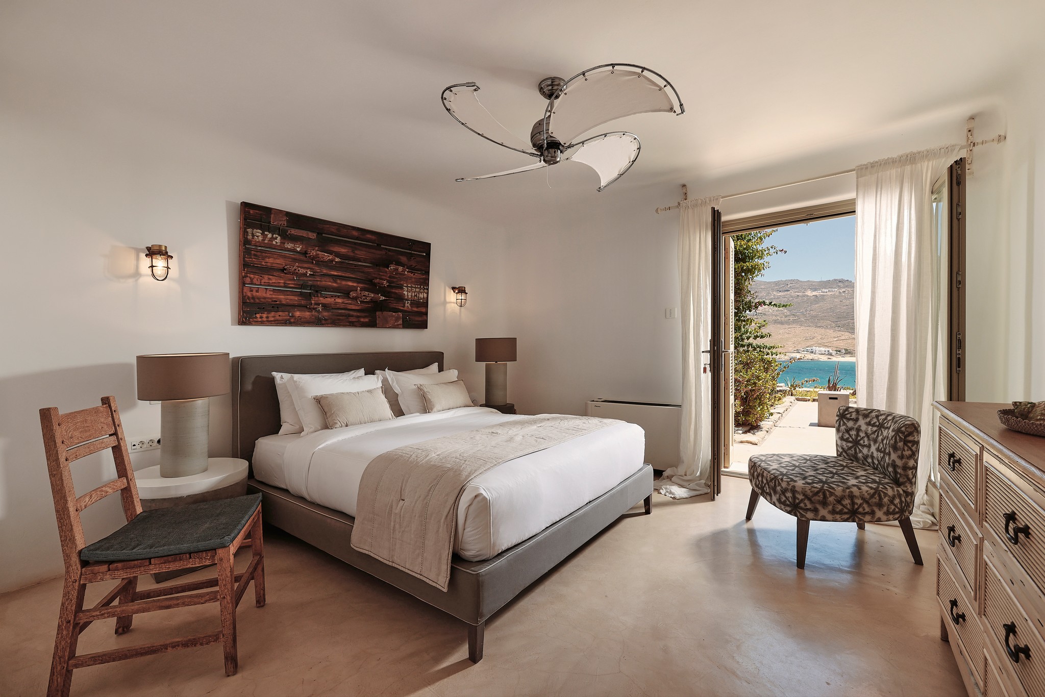 En suite bedroom on the lower level of the main house at Bali Sea Front Villa in Ftelia, Mykonos