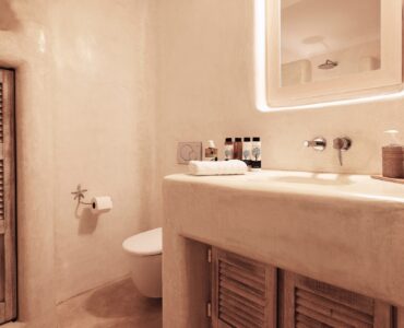 En suite bedroom on the lower level of the main house at Bali Sea Front Villa in Ftelia, Mykonos