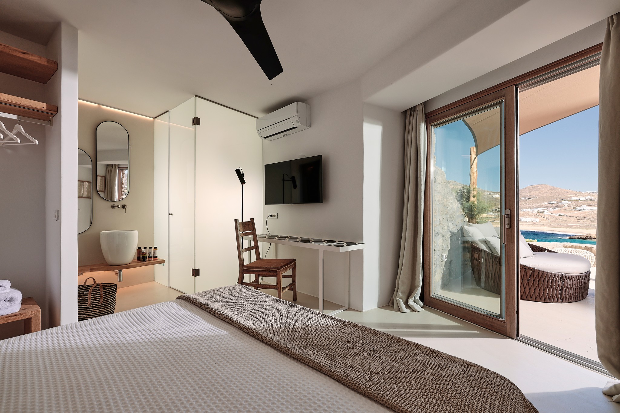 Independent guest room on the lower level at Bali Sea Front Villa in Ftelia, Mykonos