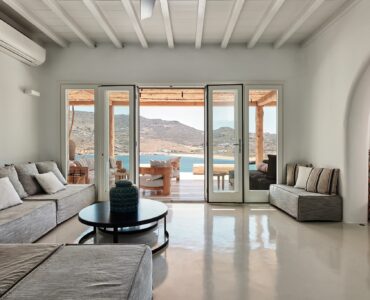 Living area with traditional Mykonian character at Bali Sea Front Villa in Ftelia, Mykonos