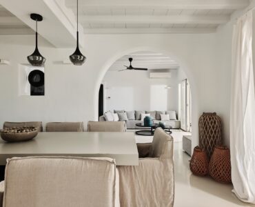 Living area with traditional Mykonian character at Bali Sea Front Villa in Ftelia, Mykonos