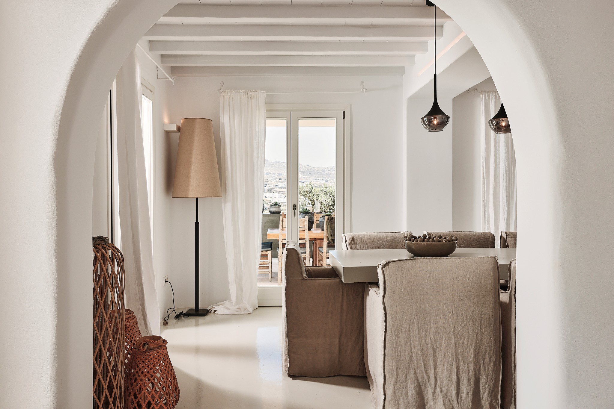 Indoor dining area at Bali Sea Front Villa in Ftelia, Mykonos