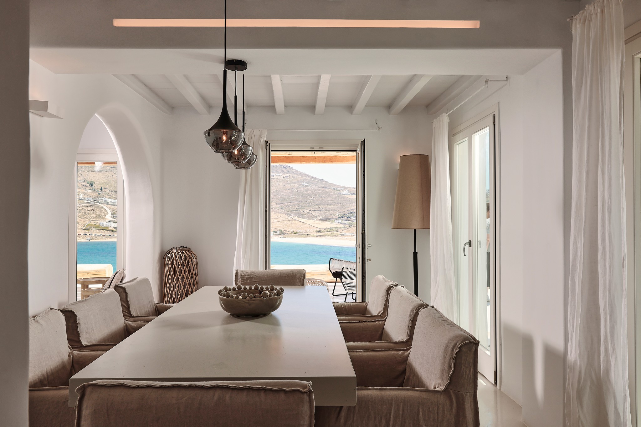 Indoor dining area at Bali Sea Front Villa in Ftelia, Mykonos