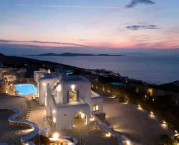 Estate and pool at sunset with island views – Grand Kanalia estate for sale in Kanalia, Mykonos