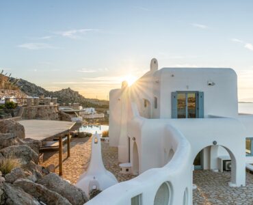 Cycladic villa architecture against the setting sun – Grand Kanalia estate for sale in Kanalia, Mykonos