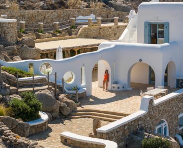 Whitewashed arches and terraces of the main villa – Grand Kanalia estate for sale in Kanalia, Mykonos