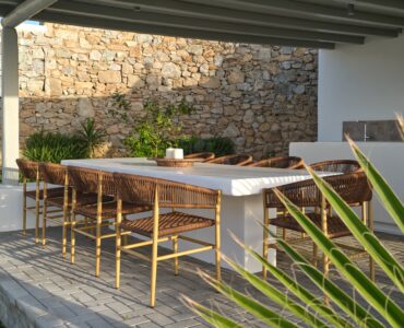 J-View Villa, Agios Lazaros, Mykonos – outdoor dining by the stone wall
