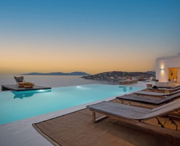 Pool deck at sunset at Maison Haute in Aleomandra, Mykonos
