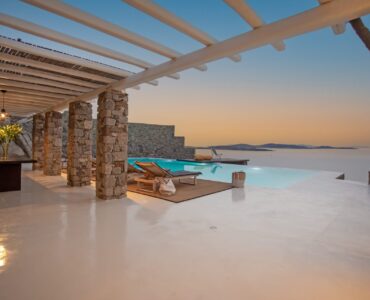 Covered terrace with sea view at Maison Haute in Aleomandra, Mykonos
