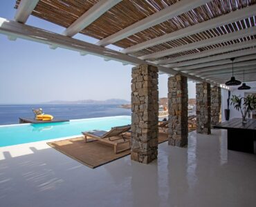 Pergola terrace by the pool at Maison Haute in Aleomandra, Mykonos