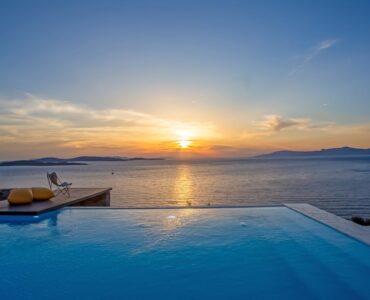 Infinity pool at sunset at Maison Haute in Aleomandra, Mykonos