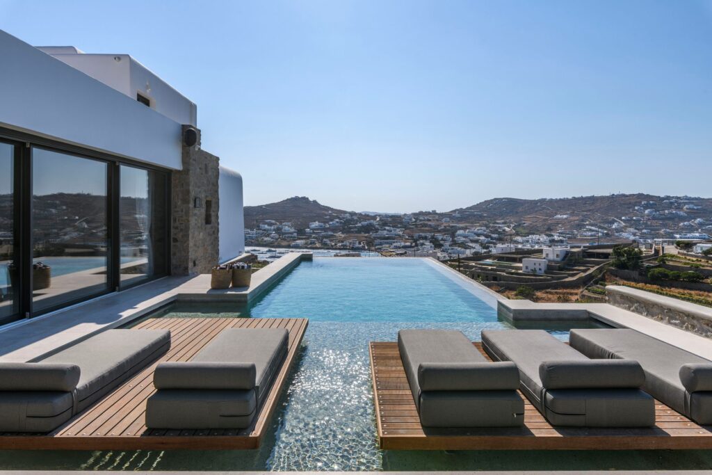 Pool terrace with island views at Muse Mansion in Agios Lazaros, Mykonos