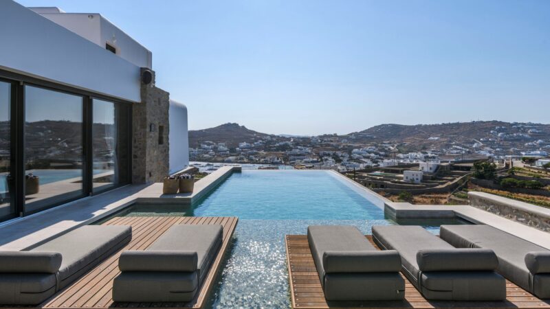Pool terrace with island views at Muse Mansion in Agios Lazaros, Mykonos