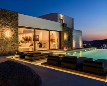 Pool terrace at sunset at Muse Mansion in Agios Lazaros, Mykonos