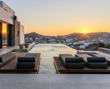 Sunset from the pool terrace at Muse Mansion in Agios Lazaros, Mykonos