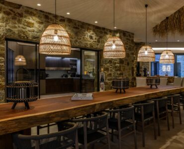 Long dining table at Muse Mansion in Agios Lazaros, Mykonos