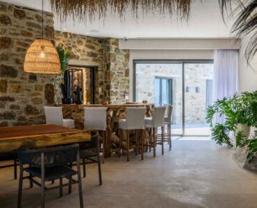 Dining area with garden view at Muse Mansion in Agios Lazaros, Mykonos