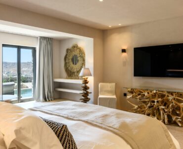Bedroom with TV at Muse Mansion in Agios Lazaros, Mykonos