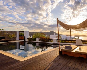 Canopy daybed with garden view at Platinum Deluxe Villa in Kalafatis, Mykonos