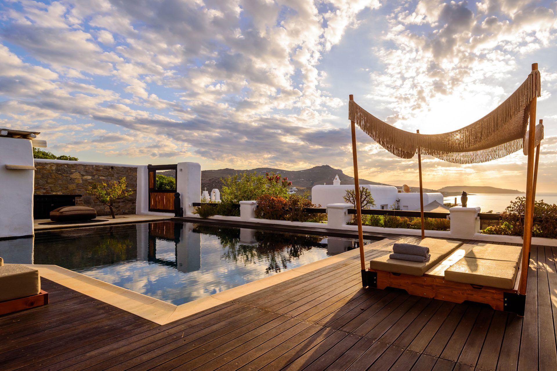 Canopy daybed with garden view at Platinum Deluxe Villa in Kalafatis, Mykonos