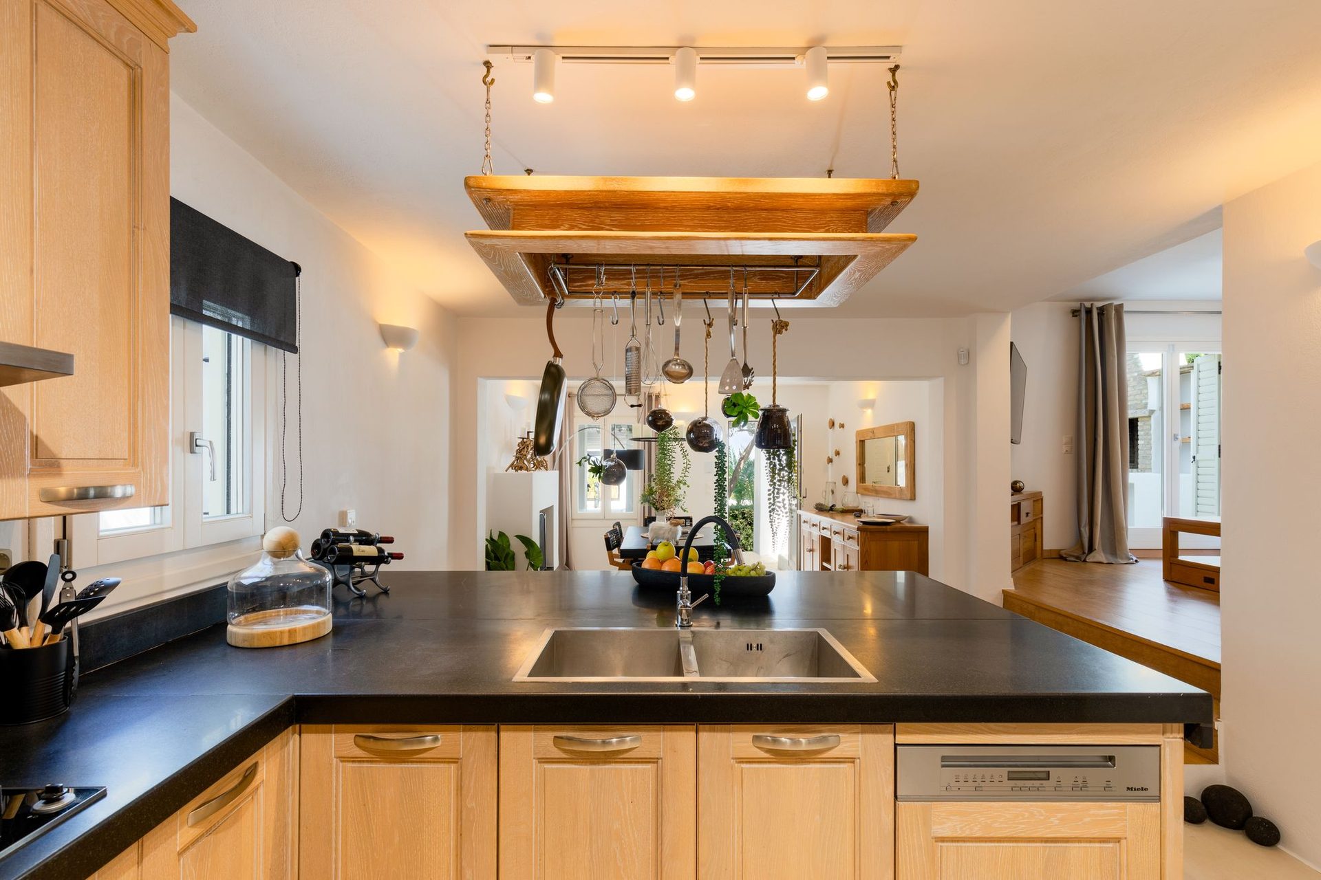 Kitchen with island at Platinum Deluxe Villa in Kalafatis, Mykonos