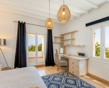 Bedroom with desk at Platinum Deluxe Villa in Kalafatis, Mykonos
