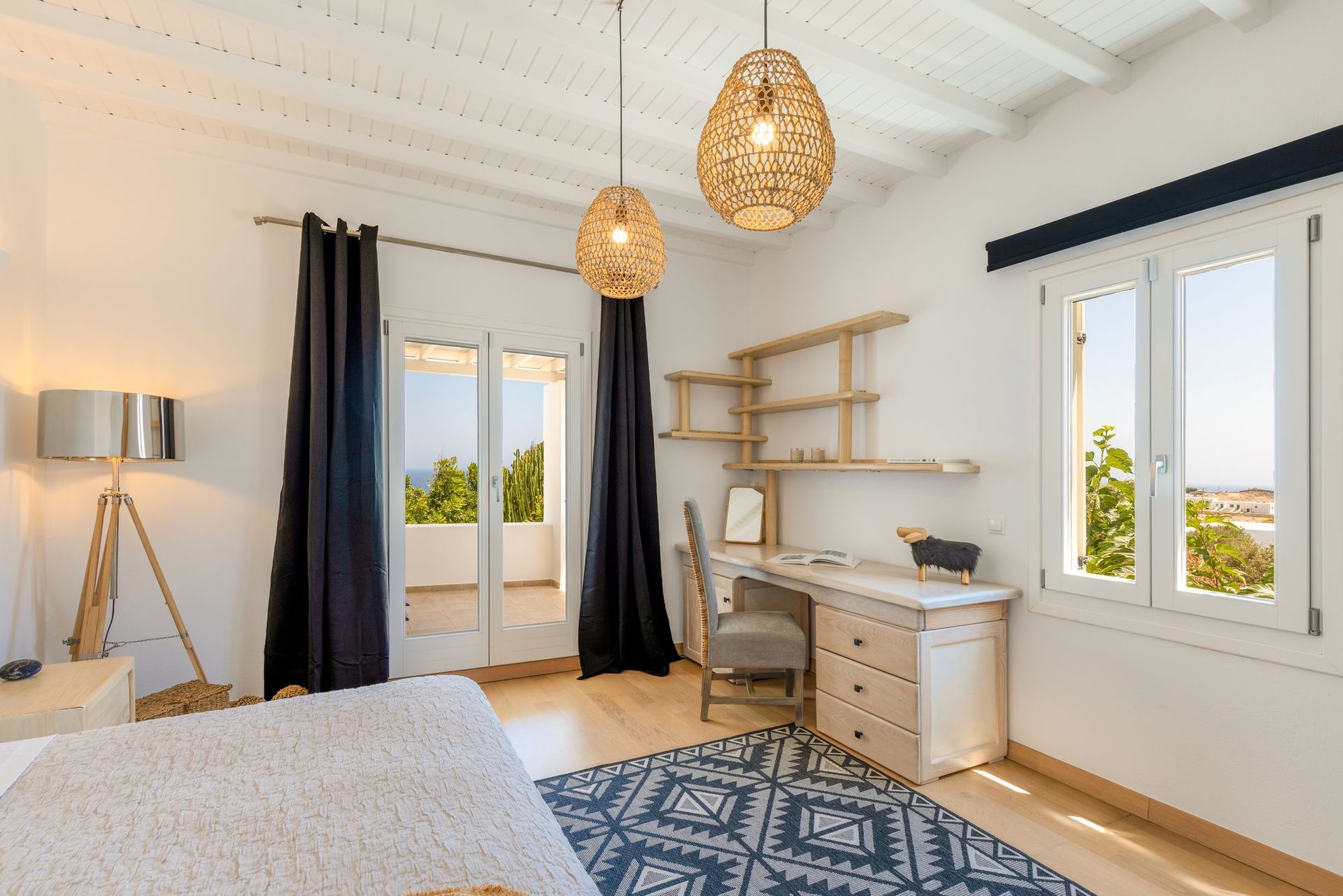 Bedroom with desk at Platinum Deluxe Villa in Kalafatis, Mykonos