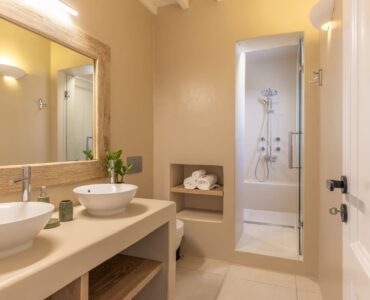Bathroom with double basin at Platinum Deluxe Villa in Kalafatis, Mykonos