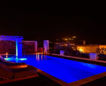 Pool lit at night at Platinum Deluxe Villa in Kalafatis, Mykonos