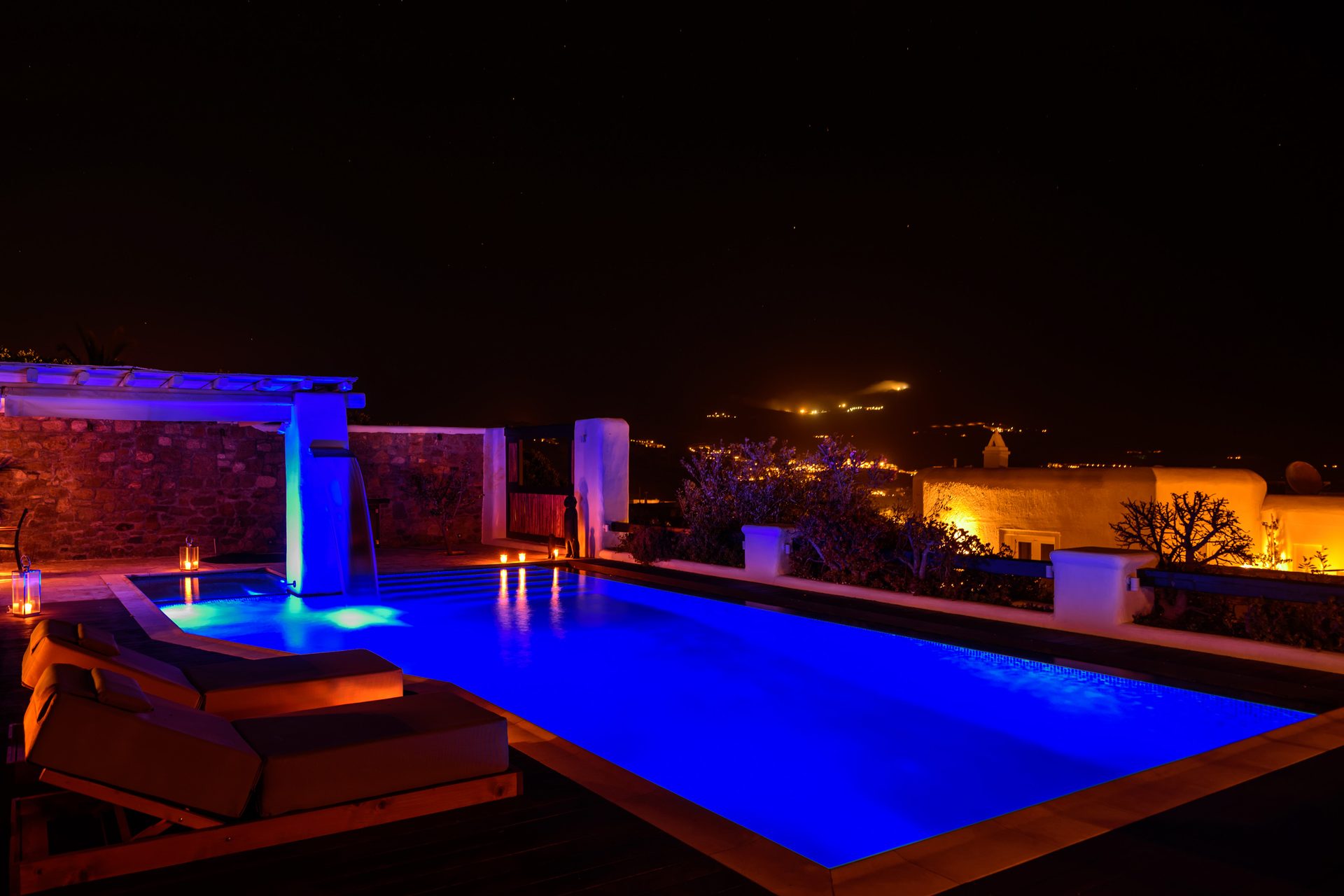 Pool lit at night at Platinum Deluxe Villa in Kalafatis, Mykonos