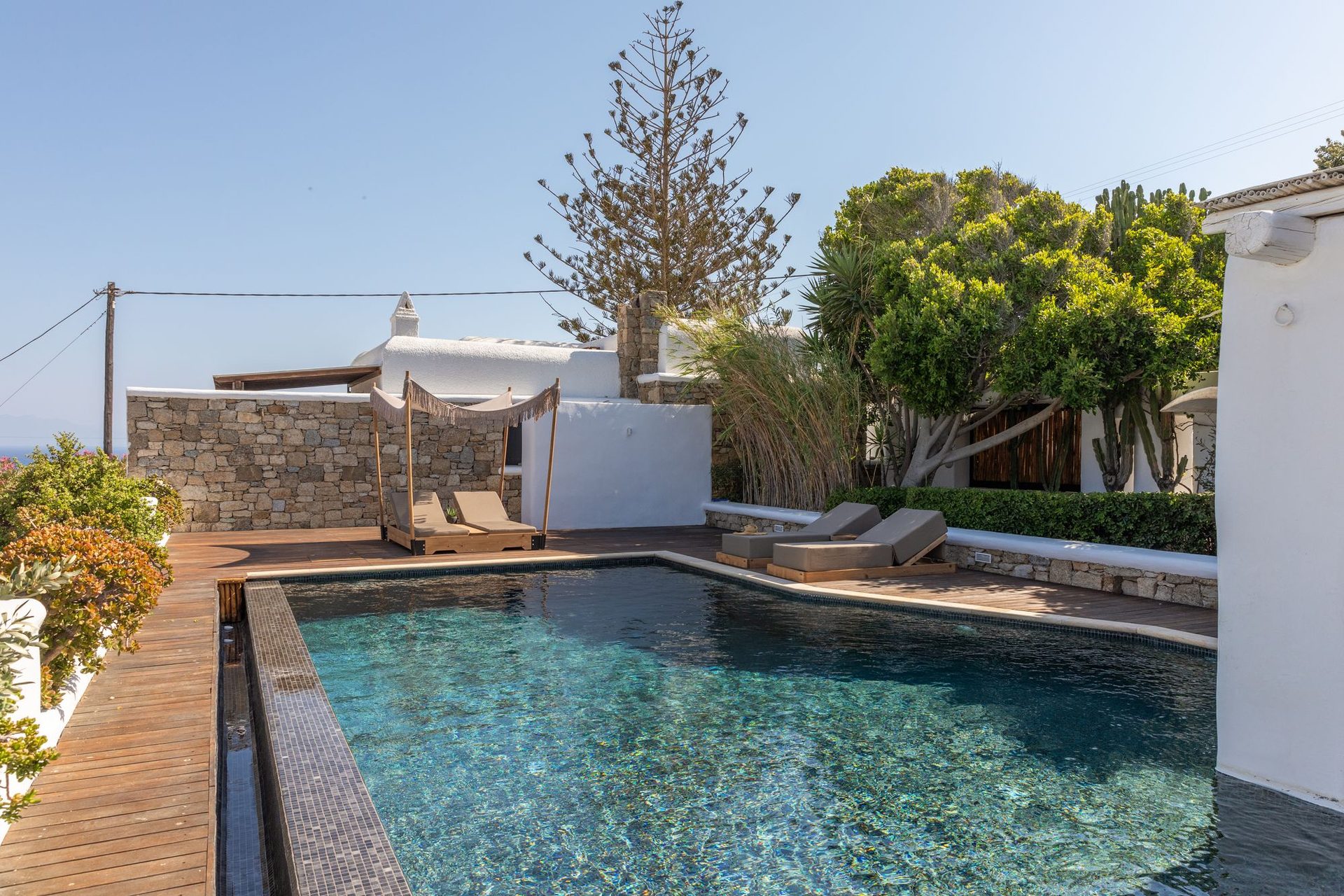 Pool and garden at Platinum Deluxe Villa in Kalafatis, Mykonos