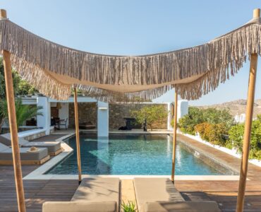 Pool with canopy shade at Platinum Deluxe Villa in Kalafatis, Mykonos