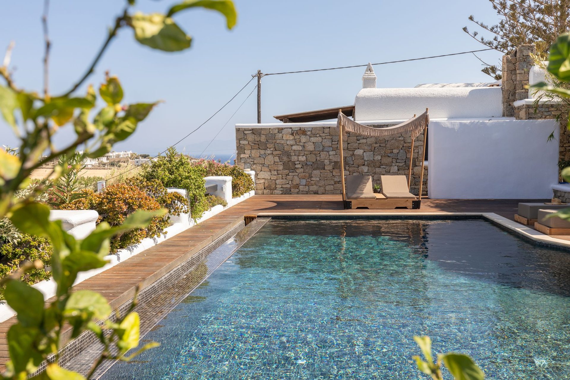 Pool in the garden at Platinum Deluxe Villa in Kalafatis, Mykonos