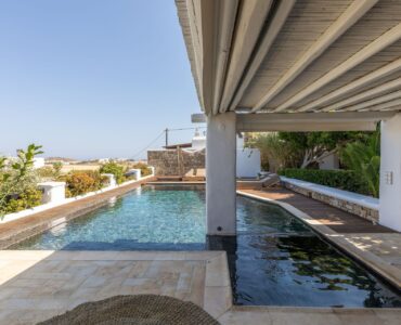 Pool from the covered veranda at Platinum Deluxe Villa in Kalafatis, Mykonos