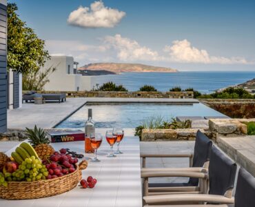 Terrace table with sea view at Platinum Senior Villa in Kalafatis, Mykonos