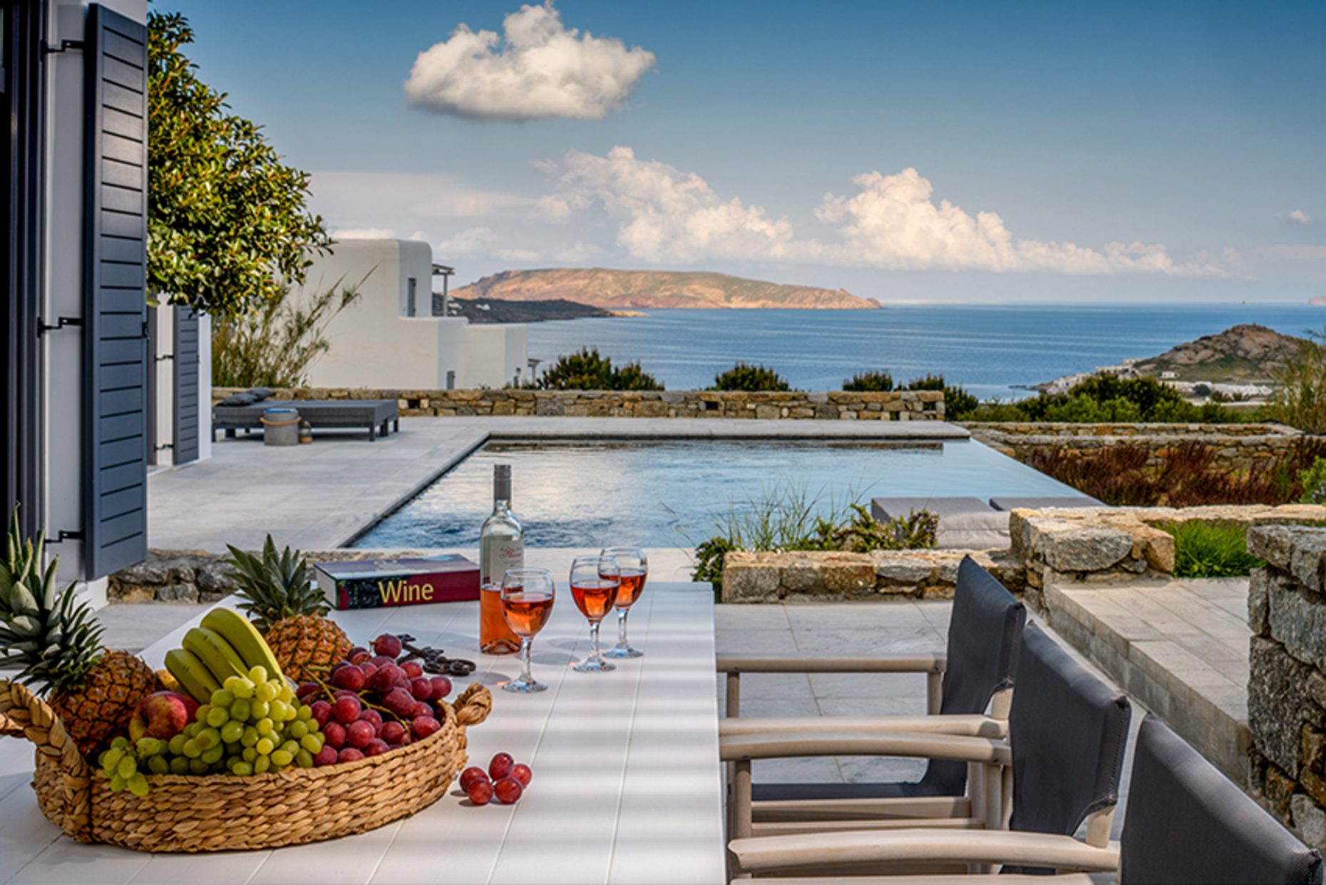 Terrace table with sea view at Platinum Senior Villa in Kalafatis, Mykonos