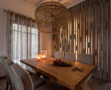 Dining area with pendant lamp at Platinum Senior Villa in Kalafatis, Mykonos