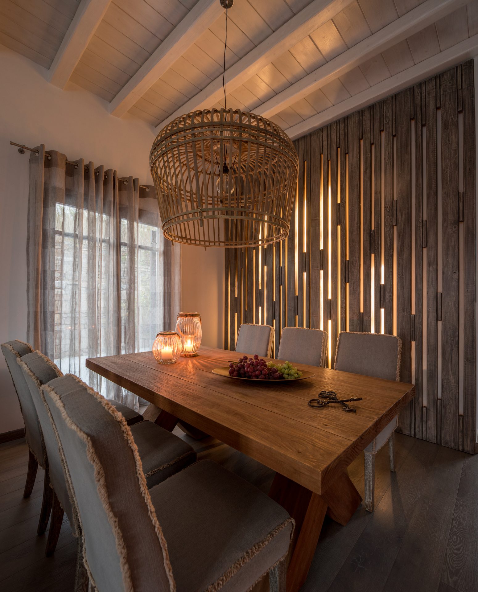 Dining area with pendant lamp at Platinum Senior Villa in Kalafatis, Mykonos