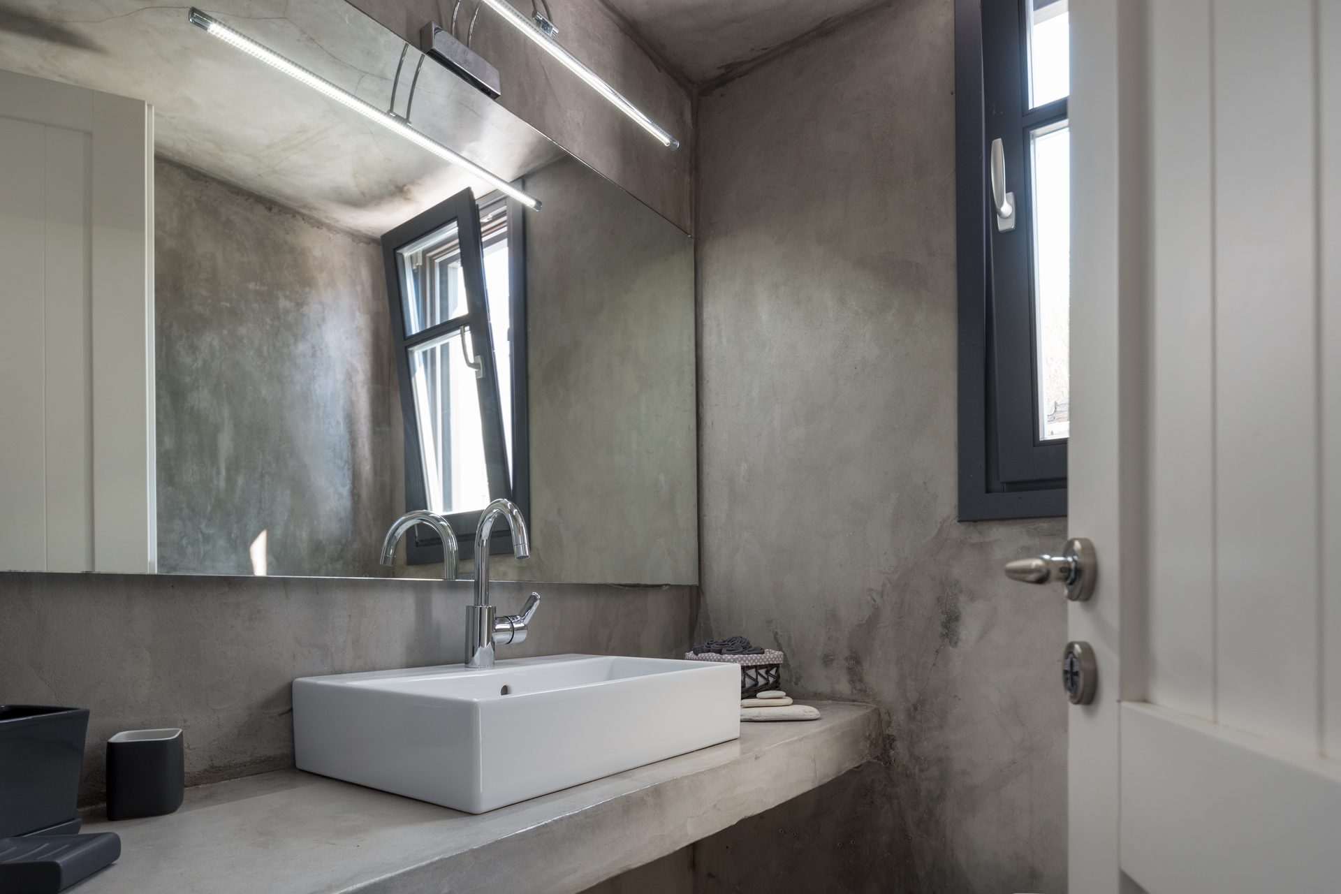 Bathroom with vessel basin at Platinum Senior Villa in Kalafatis, Mykonos