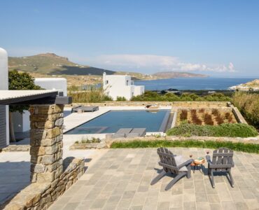 Pool terrace with countryside and sea view at Platinum Senior Villa in Kalafatis, Mykonos