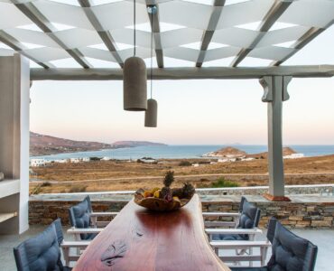 Dining table with sea view at Platinum Superior Villa in Kalafatis, Mykonos