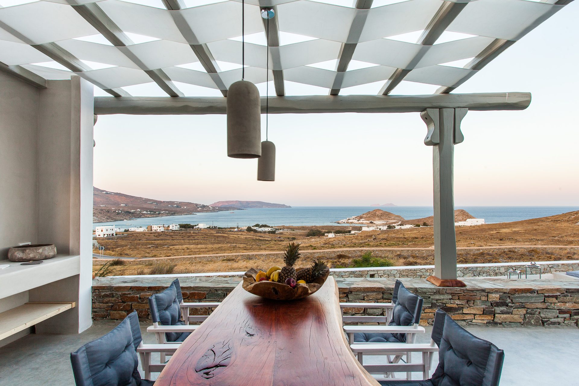 Dining table with sea view at Platinum Superior Villa in Kalafatis, Mykonos
