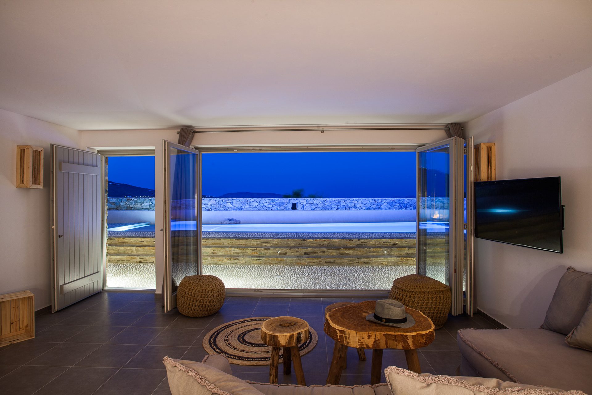 Living room opening to the sea view at Platinum Superior Villa in Kalafatis, Mykonos