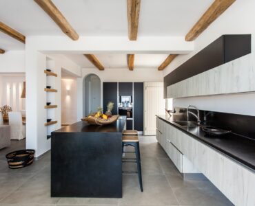 Kitchen with island at Platinum Superior Villa in Kalafatis, Mykonos