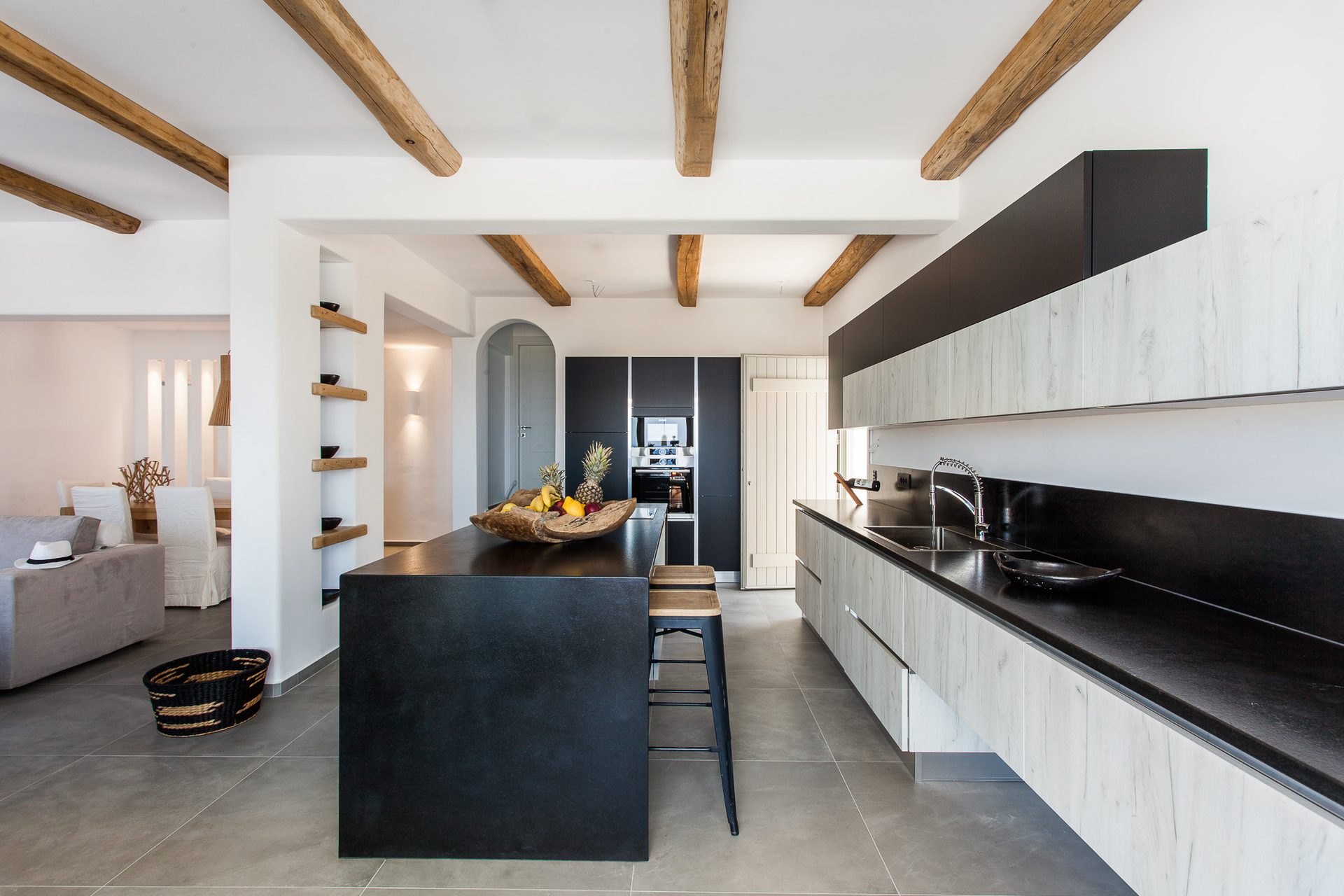 Kitchen with island at Platinum Superior Villa in Kalafatis, Mykonos