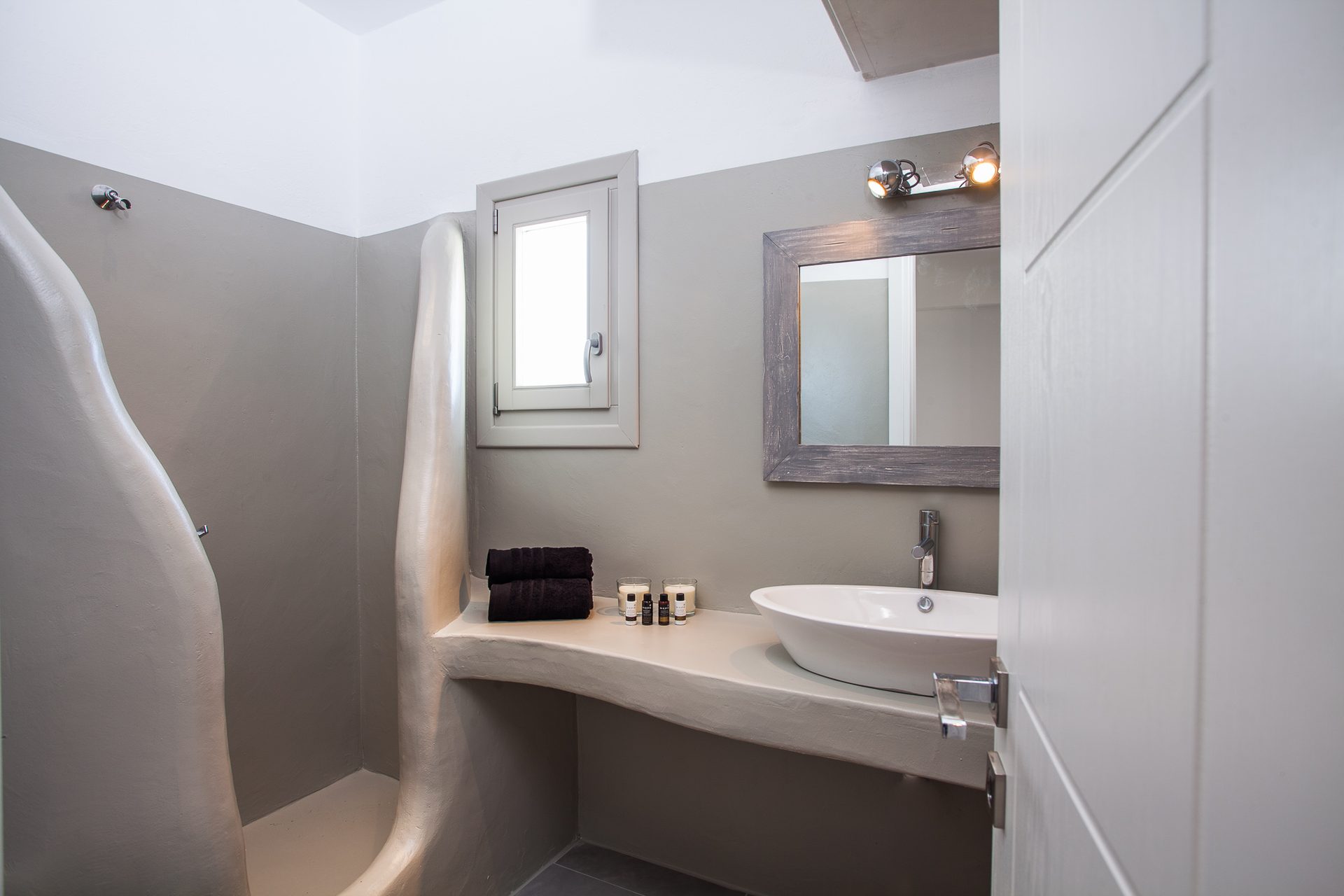 Bathroom with stone basin at Platinum Superior Villa in Kalafatis, Mykonos